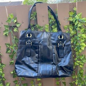 KENNETH COLE Black all leather bag. Lots of pockets & perfect for office/laptop